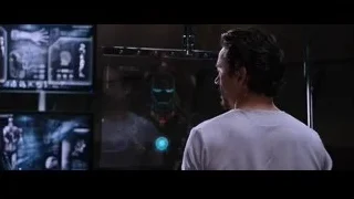 Man looking at robot on large screen — Iron Man