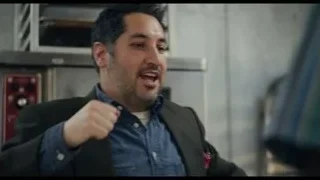 Three people conversing in kitchen — The Bear