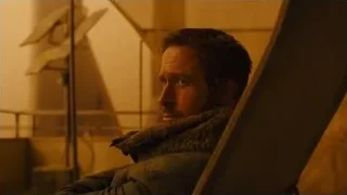 Man sitting in chair — Blade Runner 2049