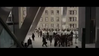 Large group walking in modern building — The Amazing Spider Man