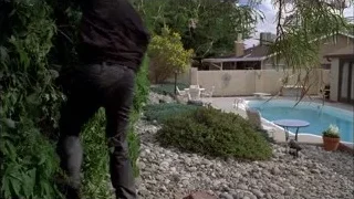 Man walking towards swimming pool — Breaking Bad