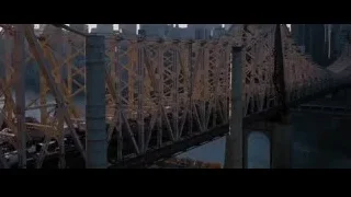 steel bridge with city skyline at night — Batman: The Dark Knight Rises