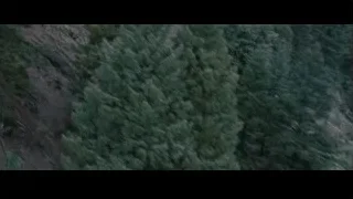 two cars parked on steep mountain road — Furious Seven