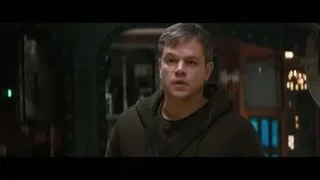 young man standing in dimly lit room — Interstellar