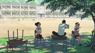 man reading to two girls in park — Your Name