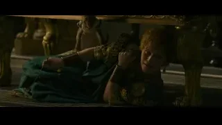 man in green gold robe on floor — Gladiator 2