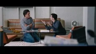 two young men talking on living room floor — The Big Short