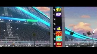 race track at night with scoreboard — Cars 3