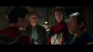 three men conversing in tense dimly lit room — Spiderman: No Way Home