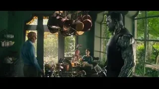 man and two women in green-walled kitchen — Deadpool 2