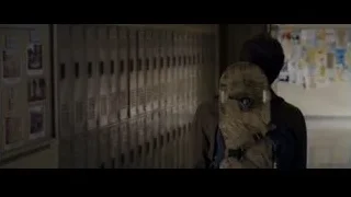 person walking down locker hallway — The Amazing Spider Man