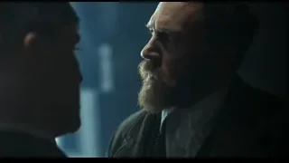 two men facing each other in dark room — Peaky Blinders