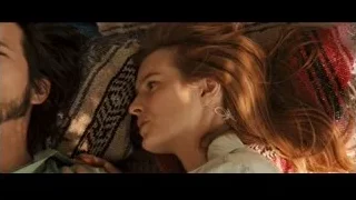 man and woman lying on blanket — Jobs