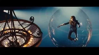 Woman floating in sphere with colorful lights — Now You See Me