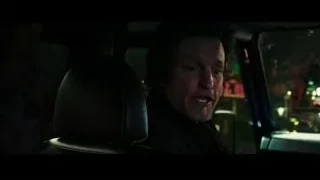 man sitting in car looking out window — Now You See Me 2