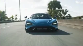 blue sports car driving on highway — Sports Cars