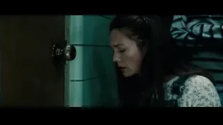 woman crying by door with key — Superman: Man of Steel