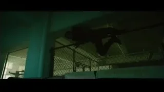 man holding rope in dark room — Furious Seven
