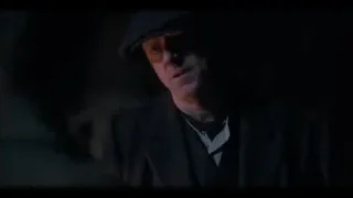 man in black coat and beret in dark room — Peaky Blinders
