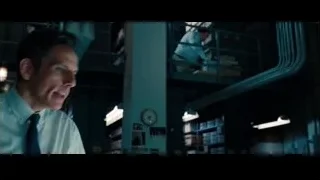 Man working in dimly lit industrial space — The Secret Life of Walter Mitty