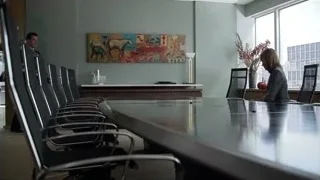three people meeting in modern office — Suits