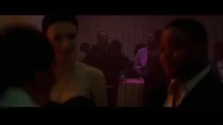 Group of people gathered in dim room — Creed 3