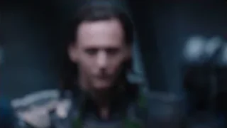 man with serious expression in dark setting — The Avengers