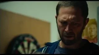 man's face in dimly lit room — The Bear