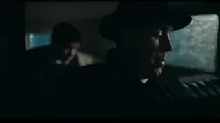 man sitting in car looking out window — Peaky Blinders