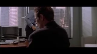 man in suit in office setting — American Psycho