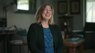 Woman smiling and gesturing in living room — Elon Musk: Return to Space