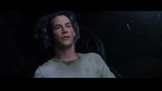 young man with closed eyes in dark room — The Matrix