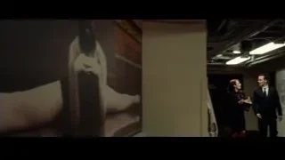 man playing violin in hallway with two people — Steve Jobs