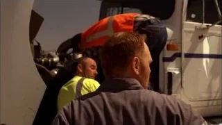 Men in safety vests by white truck — Breaking Bad