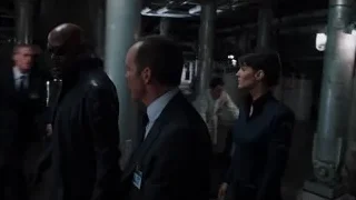 Two men walking in industrial space — The Avengers