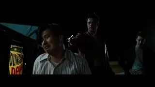 man in red jacket holding gun — Fight Club