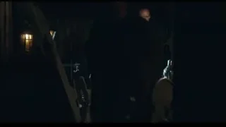 Man in suit in dark stable — Peaky Blinders