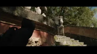 man walking up stone stairs — Iron Man 3