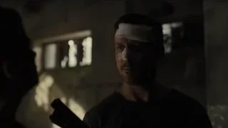 Man with bandages holding gun in room — Blade Runner 2049