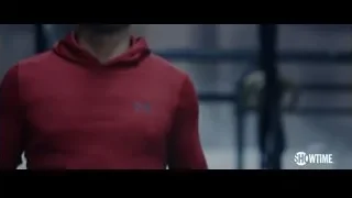man in red hoodie with serious expression — Creed 3