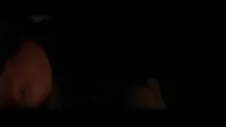 person performing stunt on metal structure at night — Batman