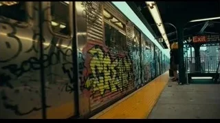 people standing on subway platform — Joker