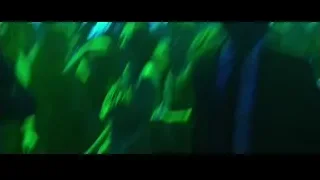 people dancing in dimly lit nightclub — John Wick