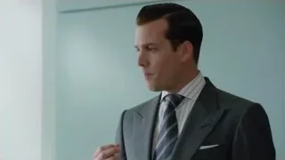 man in suit with serious expression — Suits