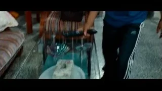girl holding remote control by table — The Karate Kid