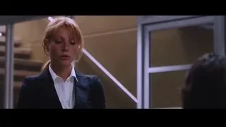 woman in business suit near staircase — Iron Man