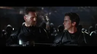 two men in black leather armor with sword — Batman