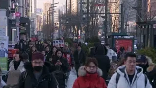 Crowd walking on busy city street — Screened Out