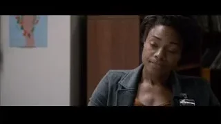 woman with serious expression in room — Southpaw