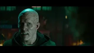 bald man shouting in dark cityscape — Deadpool 2